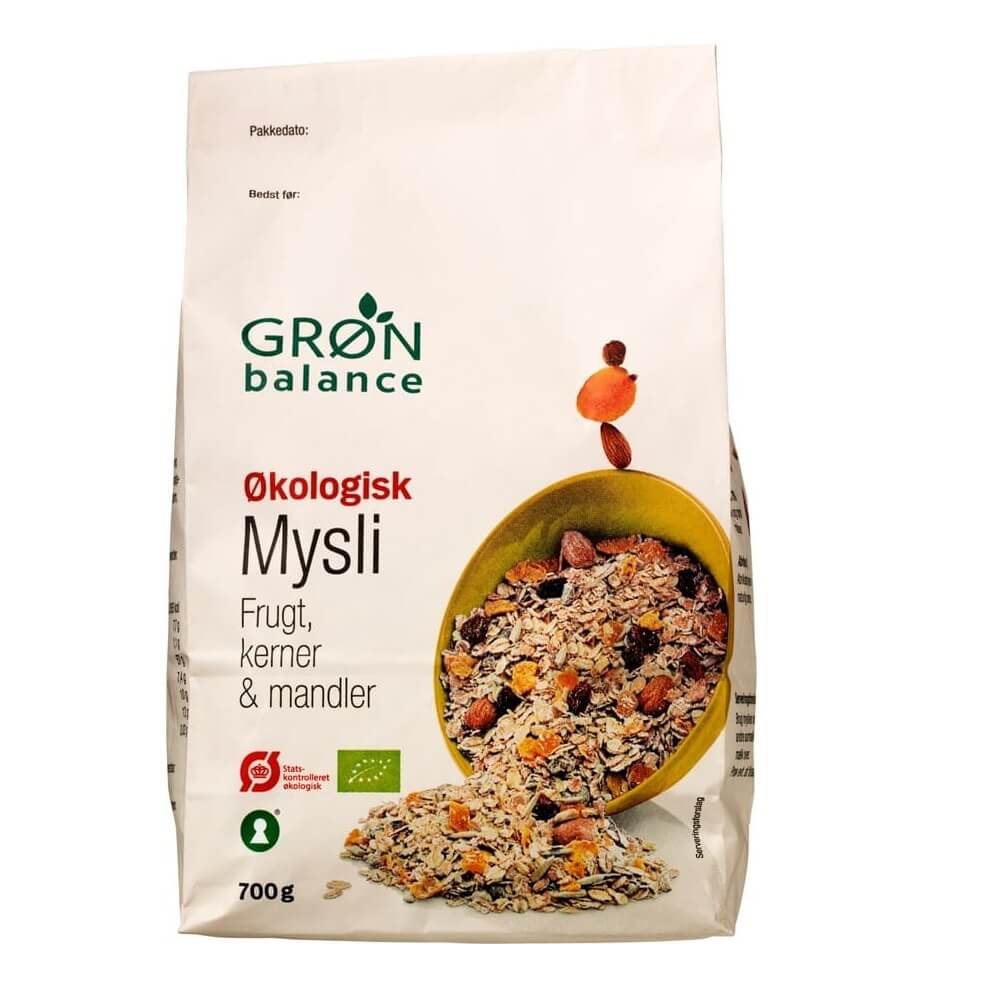Bio Müsli mit Rosinen, Aprikosen, Mandeln und Sonnenblumenkernen von GRON BALANCE, 700 g, in einer Schüssel.