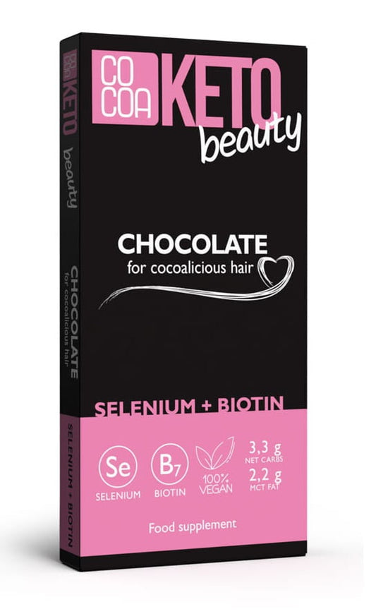 KETO BEAUTY Schokolade von COCOA, 40 g, mit Kakaogeschmack, zeigt die dunkle Schokoladenverpackung und ein Stück Schokolade.