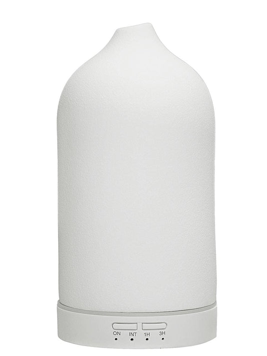 Ultraschalldiffusor für ätherische Öle in Obelisken-Form von Physalis, transparentes Gehäuse und modernes Design.