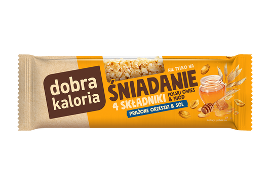 DOBRA KALORIA Frühstücksriegel mit gerösteten Nüssen und Salz, 35 g, zeigt den Riegel mit Nussstücken und Salzstücken.
