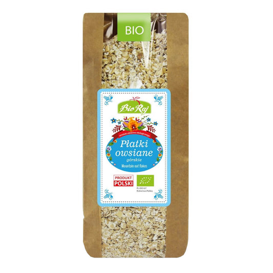 Bio Berghaferflocken von BIO RAJ, 350 g, ungekocht, in einer offenen Packung, sichtbar auf einem Holzbrett.