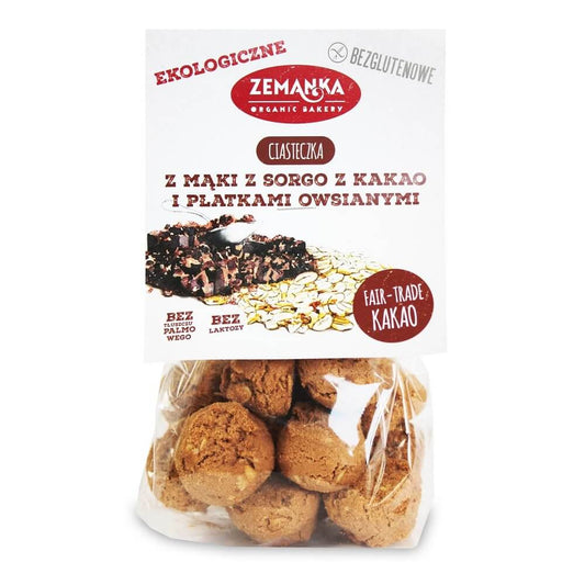 Glutenfreie Kekse aus Sorghummehl mit Haferflocken und Kakao von ZEMANKA, 100 g, auf einem Teller mit Kakaoschale.