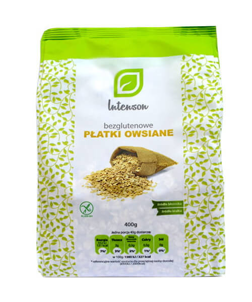 Glutenfreie Haferflocken von INTENSON EUROPE in 400g Packung, trockene, goldene Haferflocken in einer offenen Schüssel.