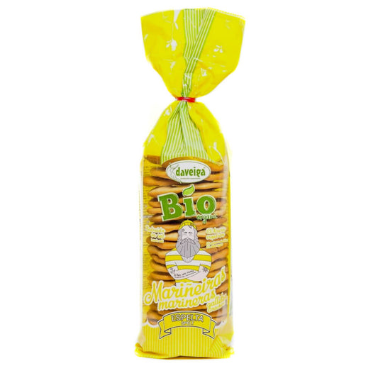 Vollkorn-Dinkelcracker von DAVEIGA, 180 g, knusprige Bio-Dinkelcracker auf einem Holztablett mit Getreide und Kräutern.