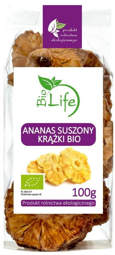 Getrocknete Ananasringe von BIO LIFE, 100g, bio und ECO-zertifiziert, liegen in der Verpackung auf einem weißen Hintergrund.