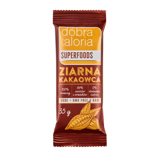 Kakaobohnen Fruchtriegel ohne Zucker, 35g von DOBRA KALORIA, natürliche Snack-Option, sichtbarer Riegel mit Kakaobohnen.