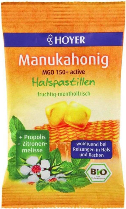 BIO Pastillen mit Manukahonig von HOYER, MGO 150, in 30 g Verpackung, nahe Ansicht der Honigpastillen auf der Packung