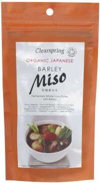 Bio Gersten-Miso von CLEARSPRING, 300 g, cremige japanische Paste in einer weißen Schüssel, frische Zutaten sichtbar