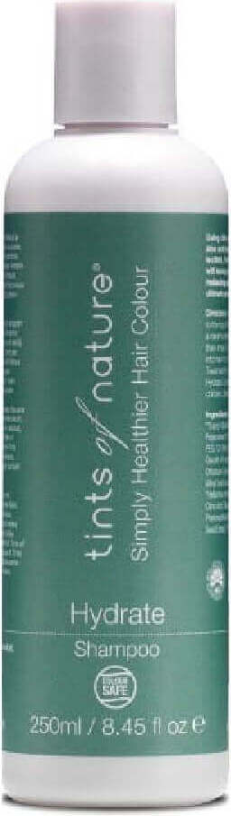 Feuchtigkeitsshampoo von TINTS OF NATURE in 250 ml Flasche, zeigt die schäumende Textur und natürliche Inhaltsstoffe.