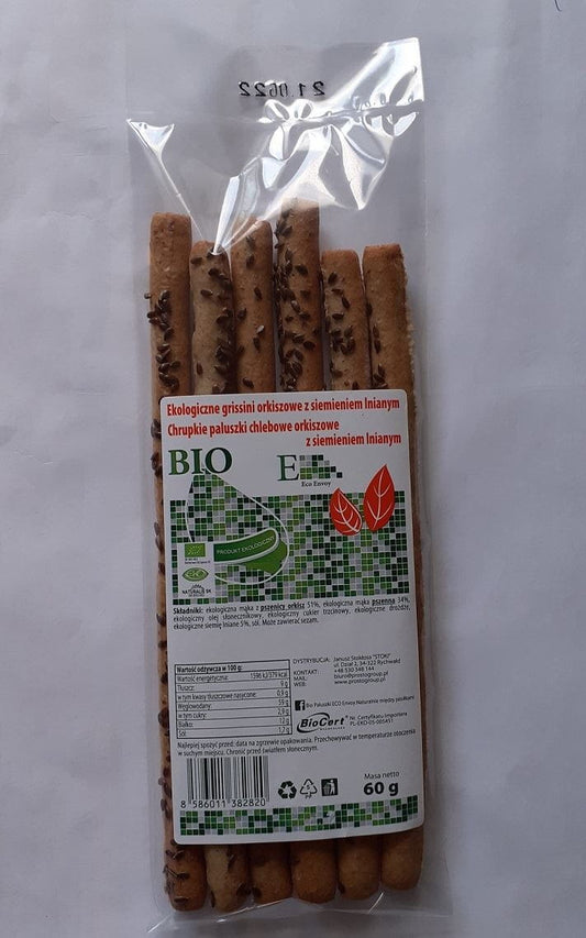 Dinkelbrotfinger mit Leinsamen, BIO, von PALUSZKI BIO - ENVOY, knusprige BIO-Grissini auf einem weißen Teller.