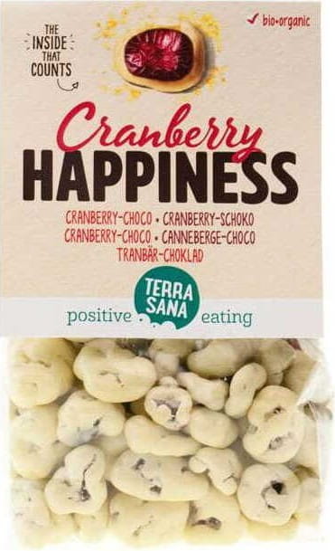 Weiße Bio-Schokolade mit Cranberries von TERRASANA, 150 g, zeigt die cremige Schokolade mit roten Cranberry-Stückchen.