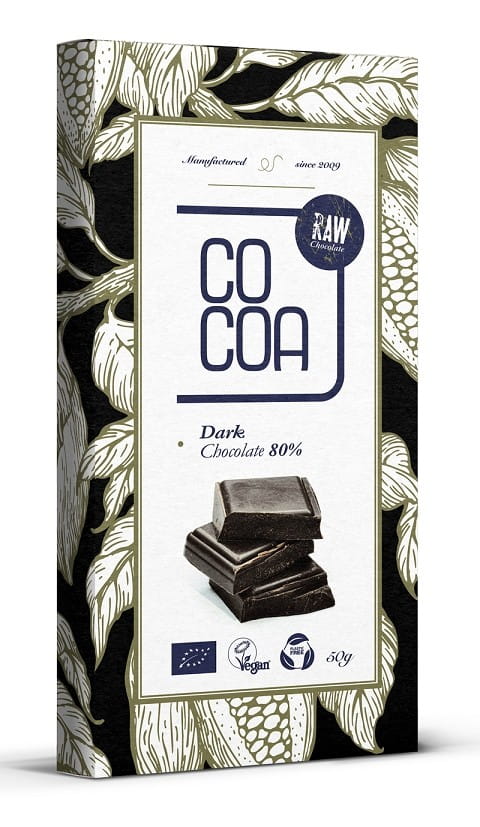 Dunkle Bio-Schokolade mit 80% Kakao von COCOA, 50 g, sichtbare Stücke und glatte Oberfläche in der Verpackung
