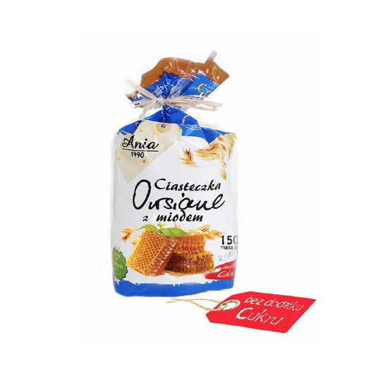 Haferkekse mit Honig von ANIA, 150 g, frisch gebacken, knusprig und goldbraun, auf einem weißen Teller.