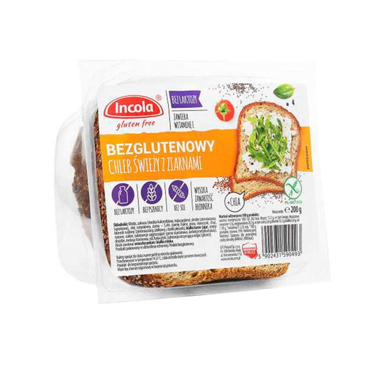 Frisches, glutenfreies Körnerbrot von GFS POLAND, 350 g, mit sichtbaren Saaten und Körnern auf einer Holzplatte.