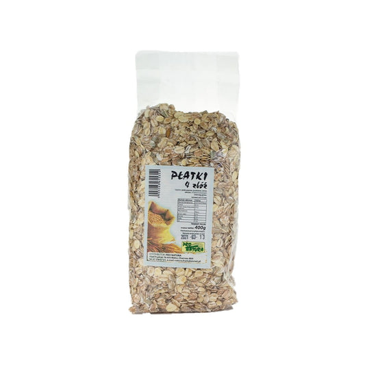 Vorratsdose mit Flocken 4 Cerealien von PRO NATURA, 400 g, zeigt die bunten Getreideflocken in der Dose