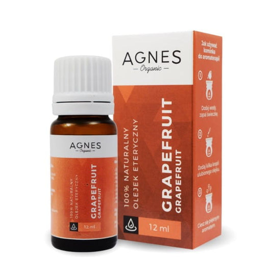 Ätherisches Grapefruitöl von AGNES ORGANIC in 12 ml Flasche, gelbe Zitrusfrüchte und Tropfen auf weißem Hintergrund
