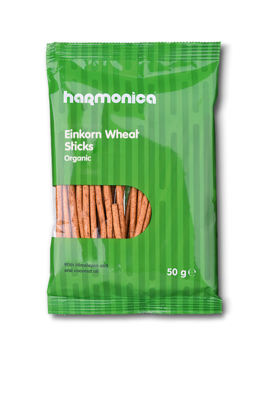HARMONICA BIO PERFECT STICKS 50 g, natürliche Harmonie-Kekse, frisch gebacken, goldbraun, mit zarter Textur auf einem Teller.